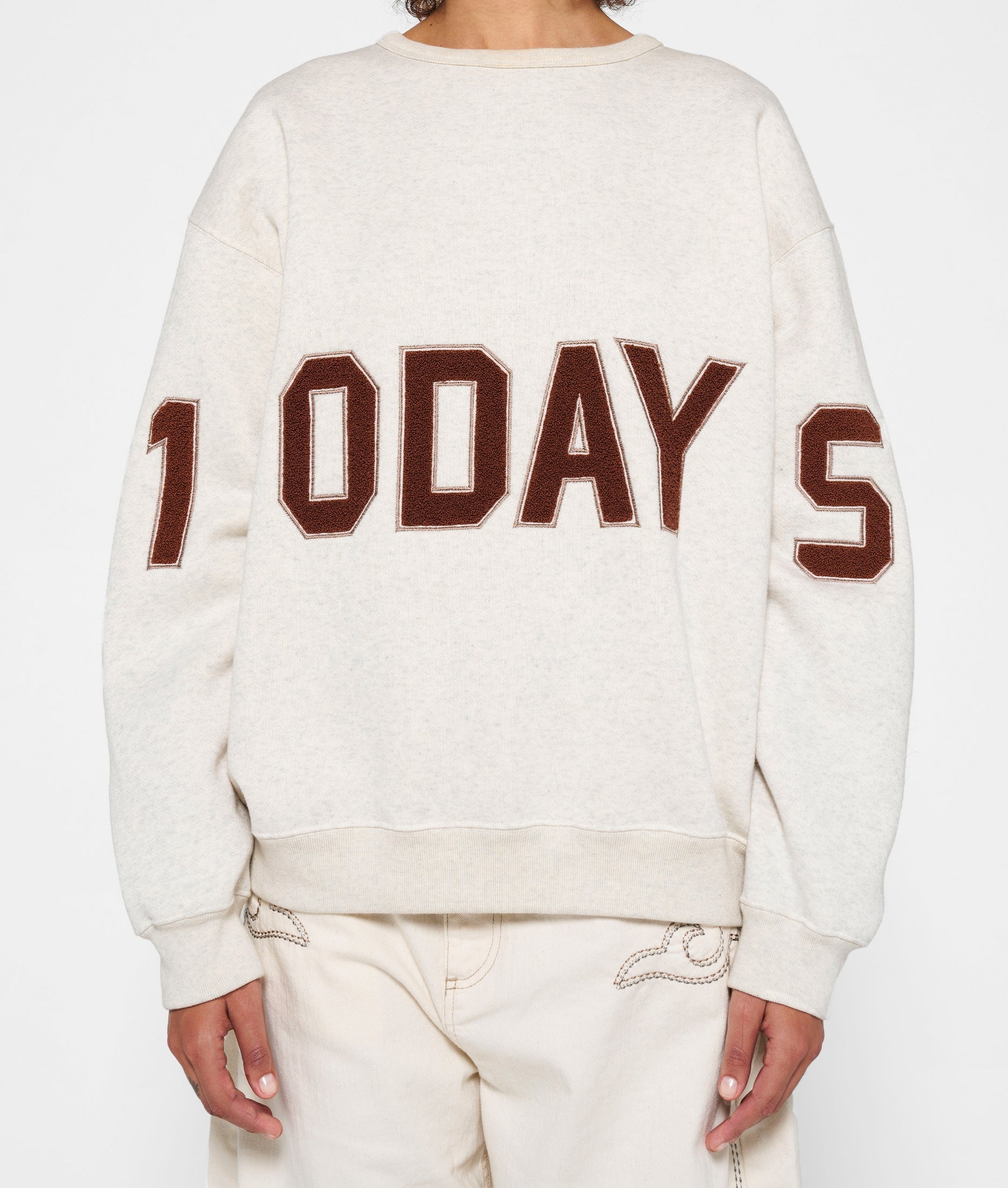 10 DAYS Statement Swaeter Logo